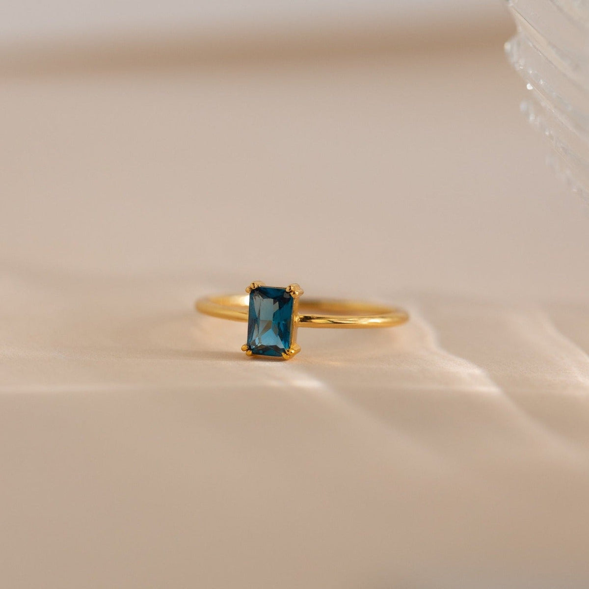 Blue topaz emerald-cut ring