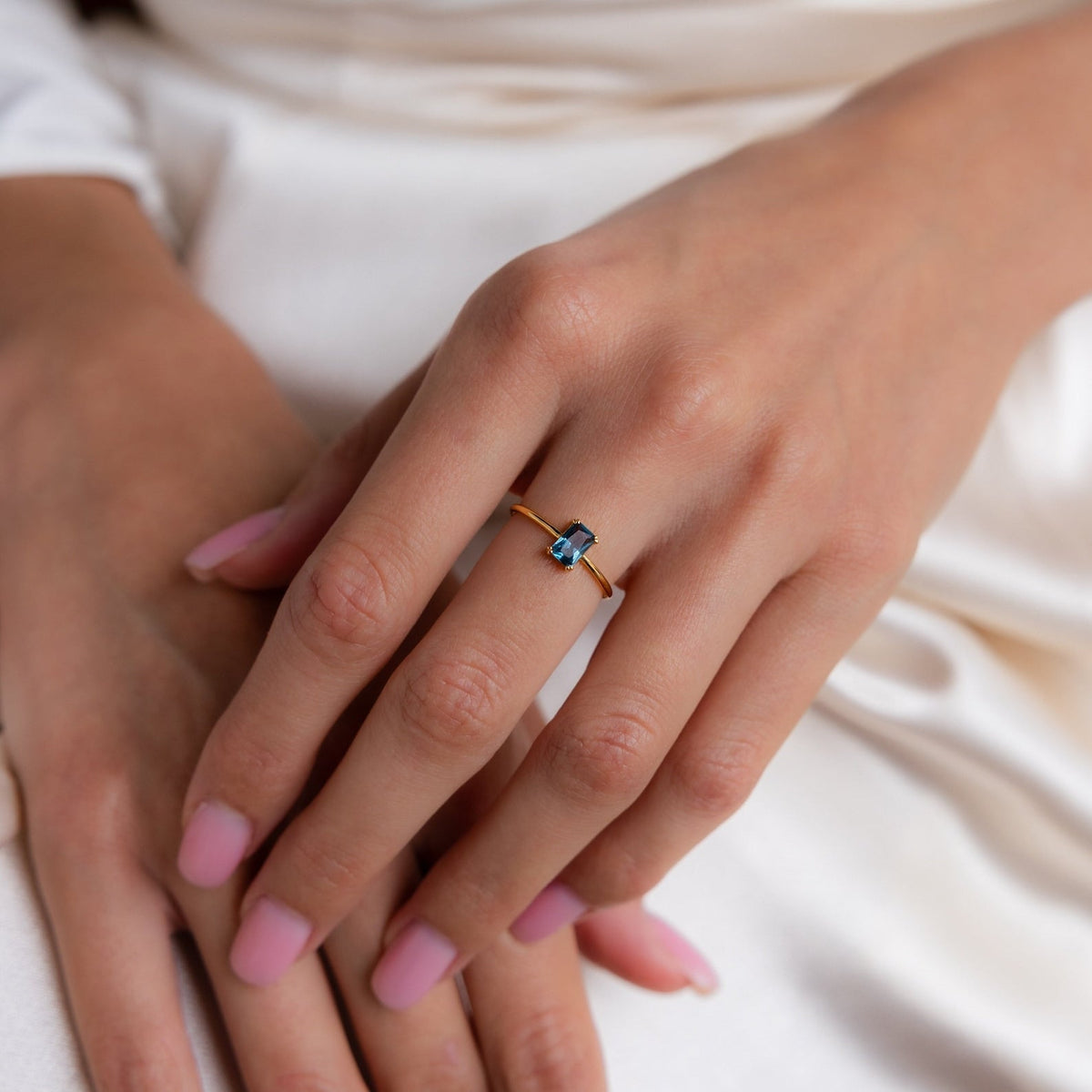 Blue topaz emerald-cut ring