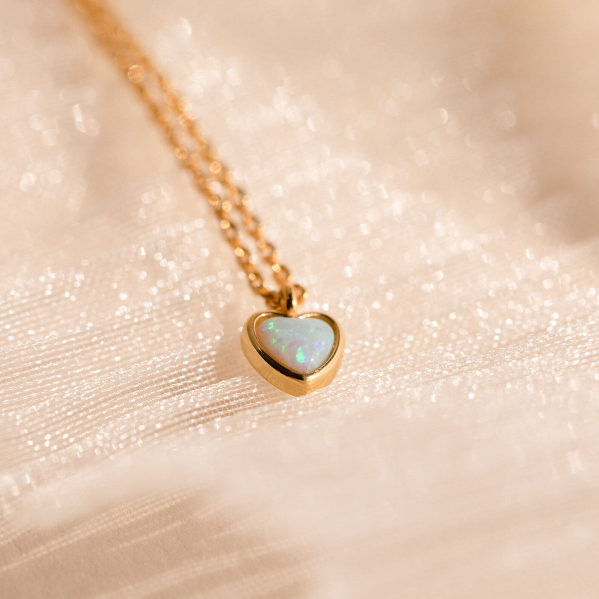 Tiny opal heart necklace