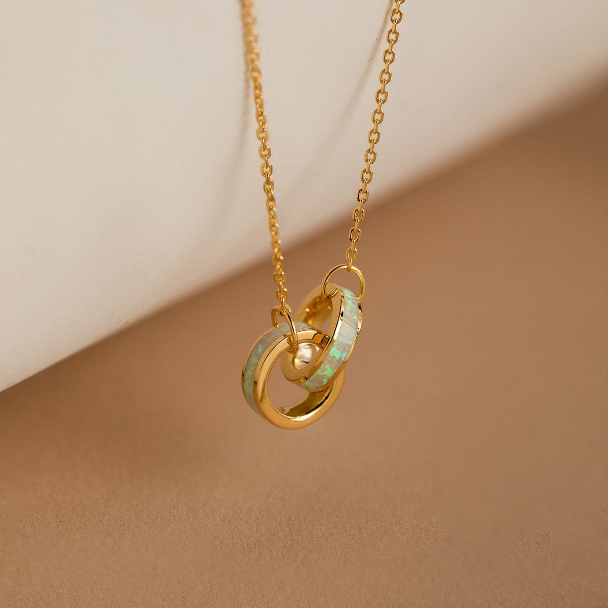 Interlocking opal inlay necklace