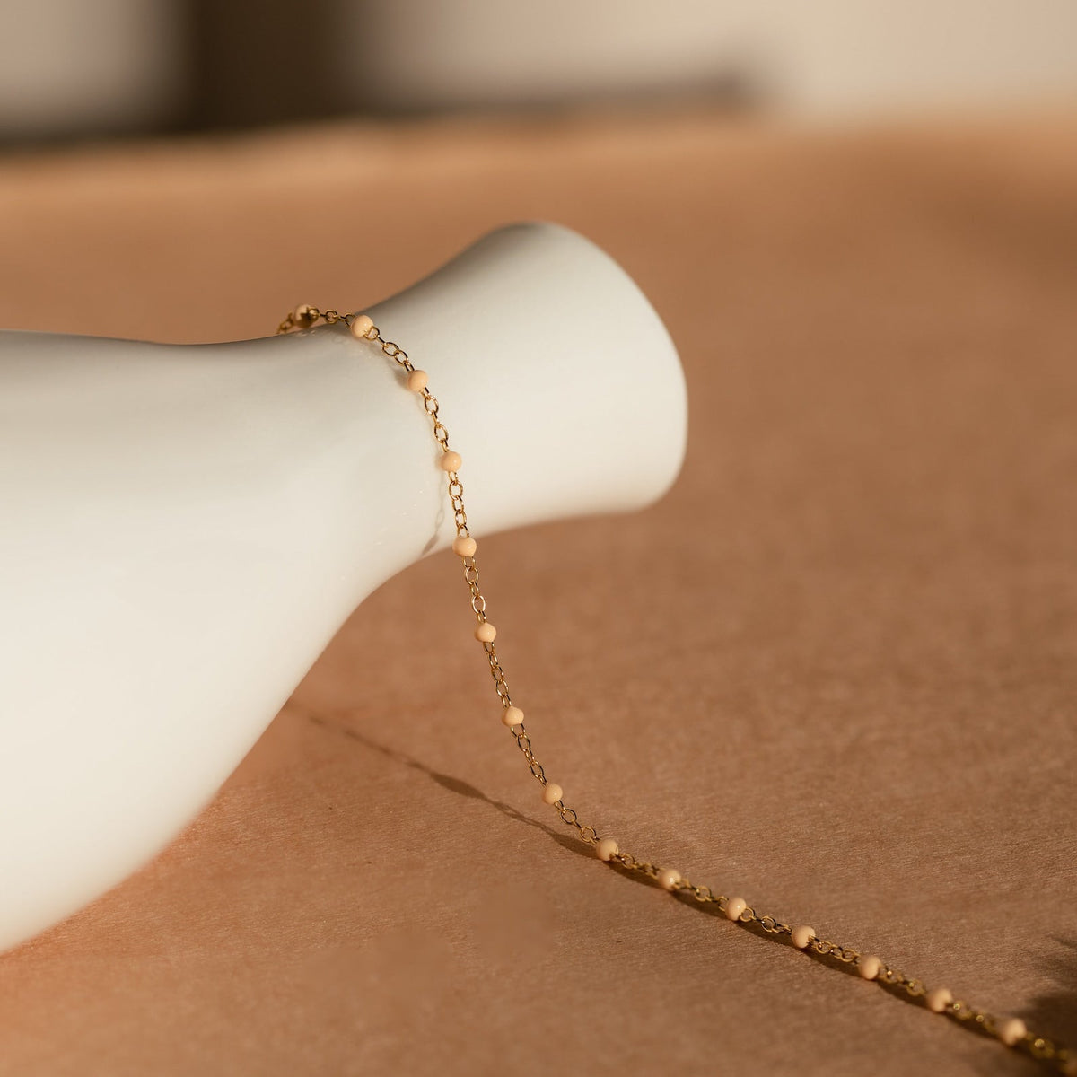 Peach station necklace