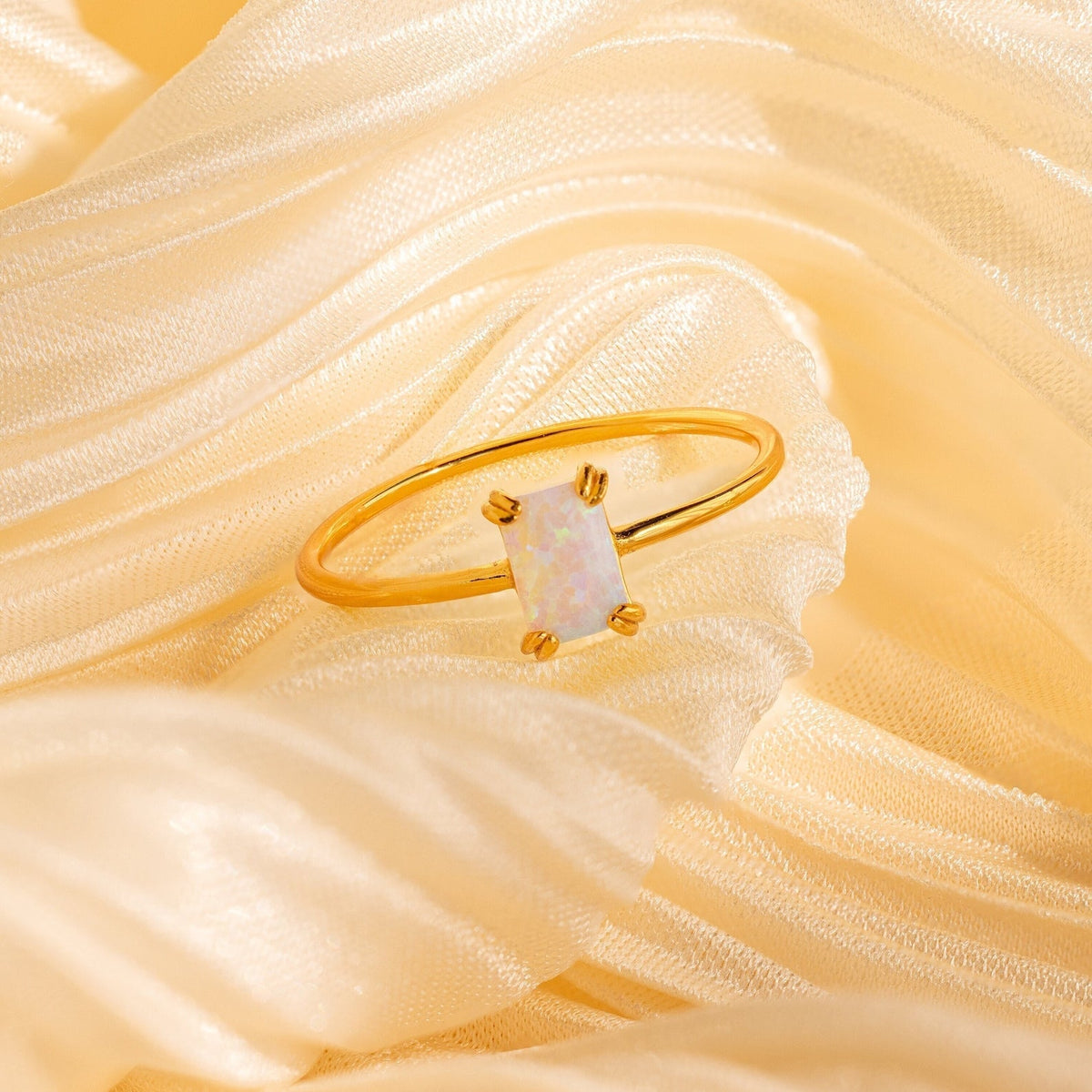 Emerald-cut opal ring