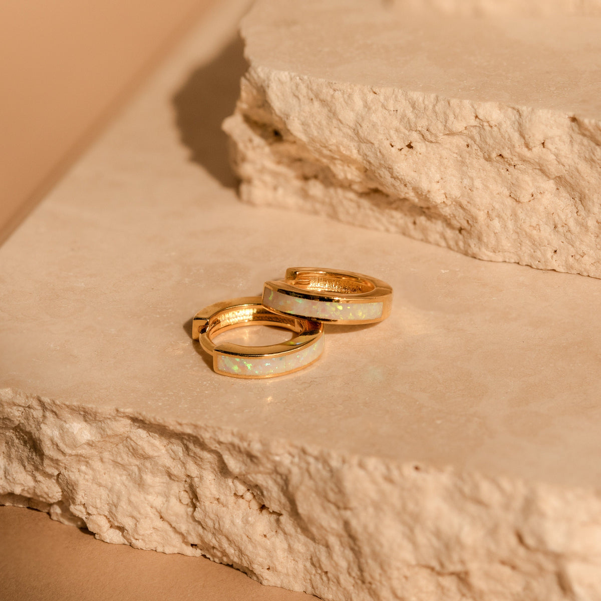 White opal inlay huggies