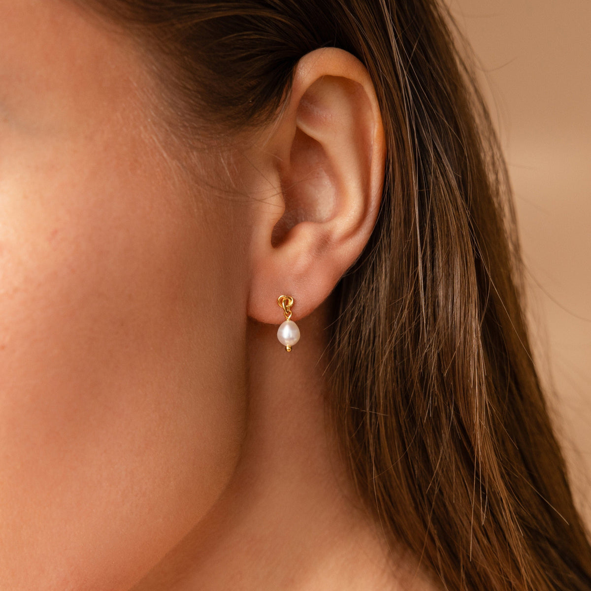 Dainty knot pearl earrings