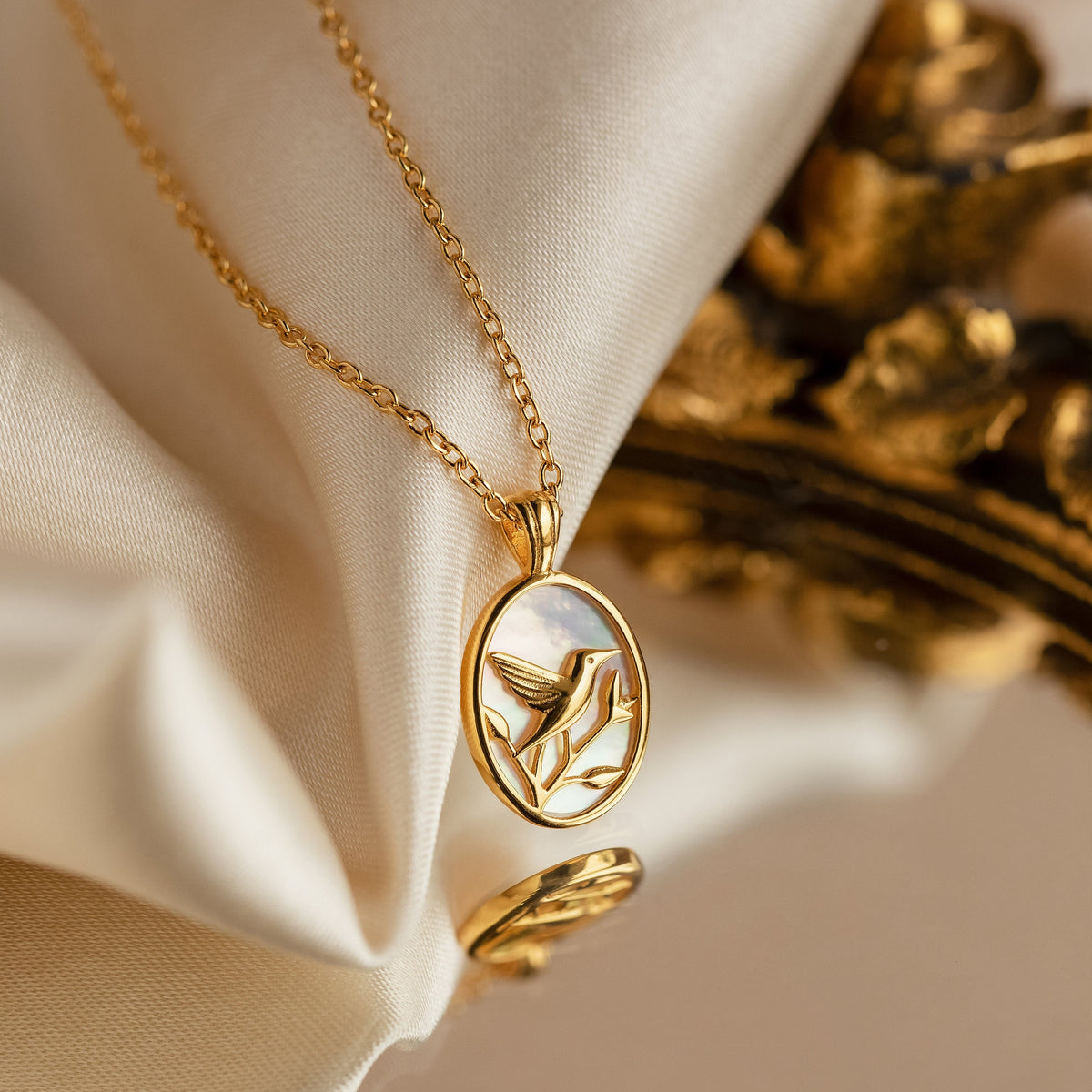 Pearl hummingbird necklace
