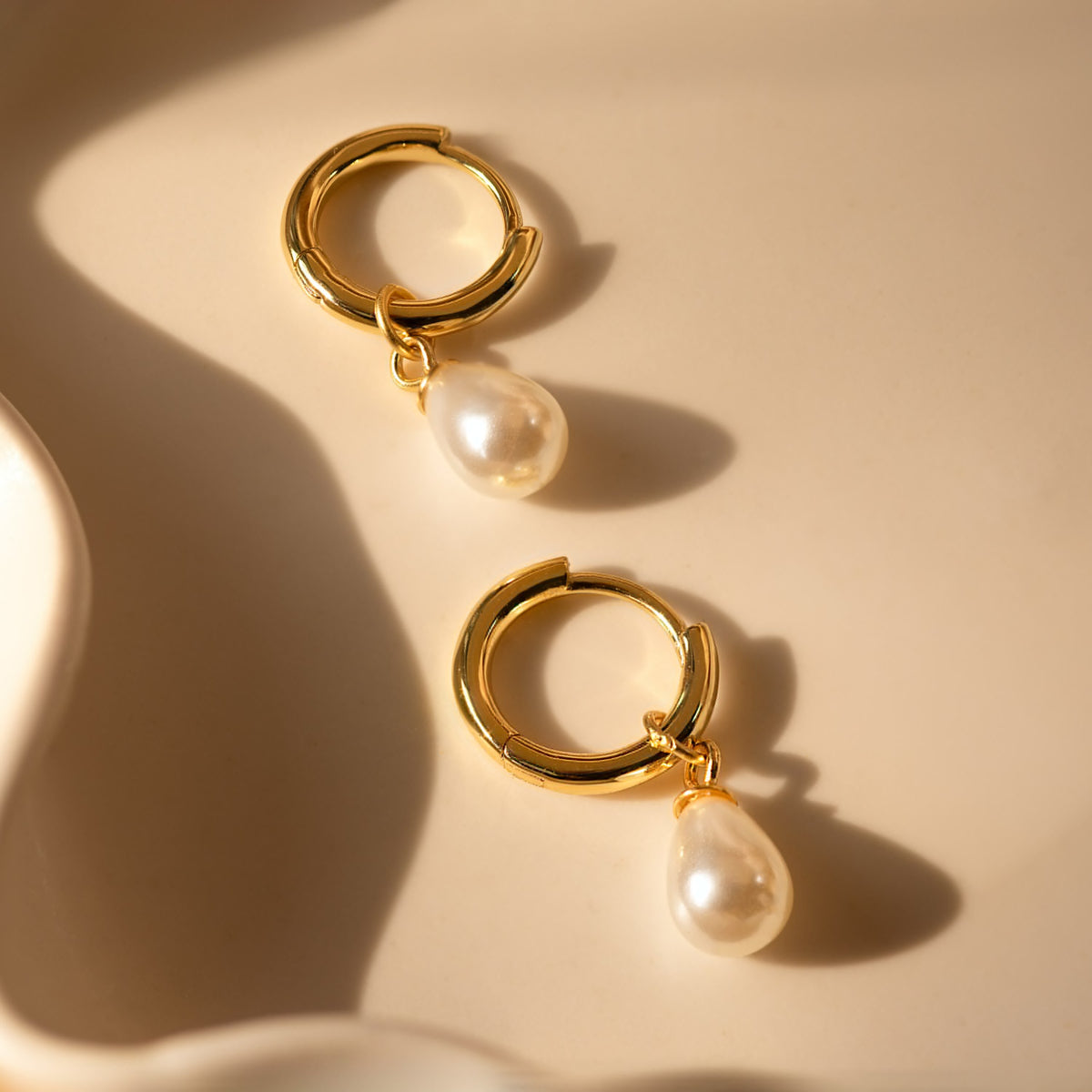 Dainty pearl huggies