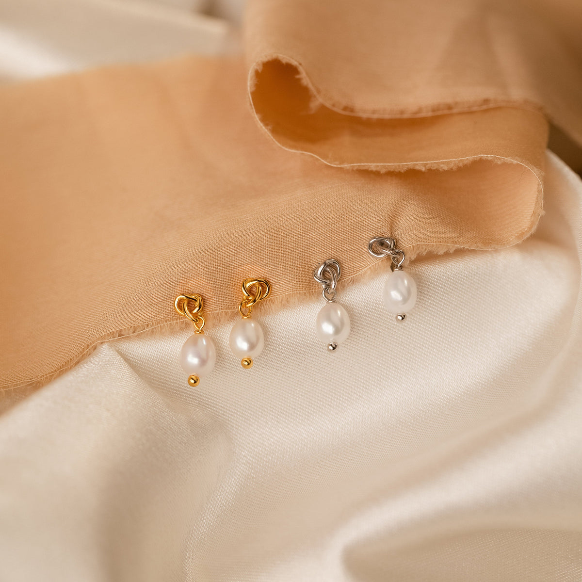 Dainty knot pearl earrings
