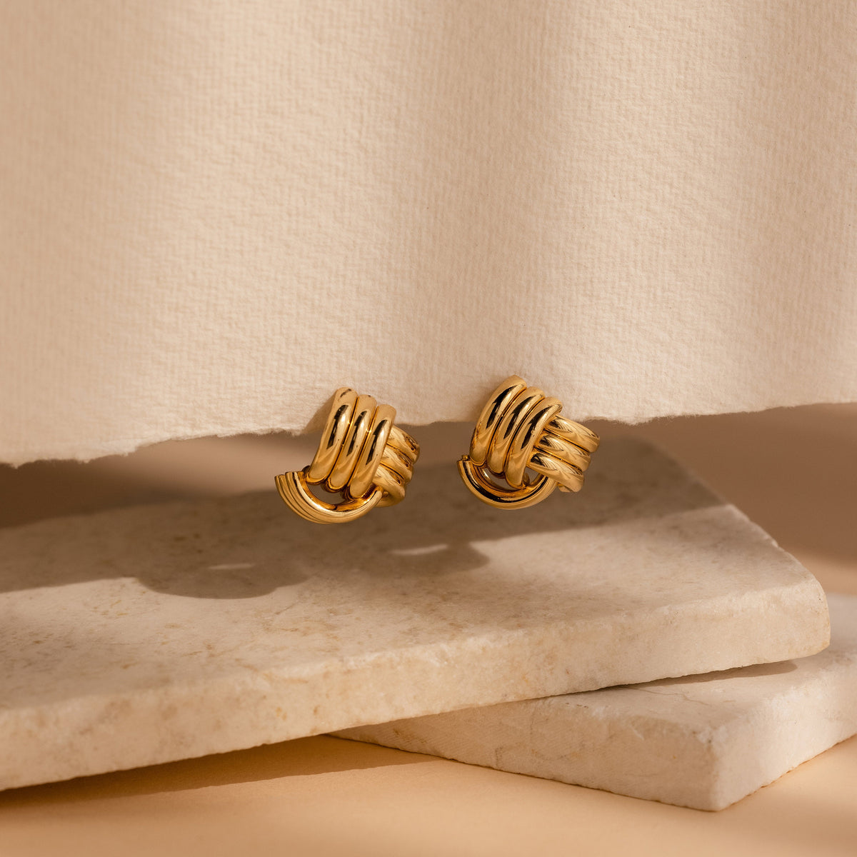 Bold triple knot studs