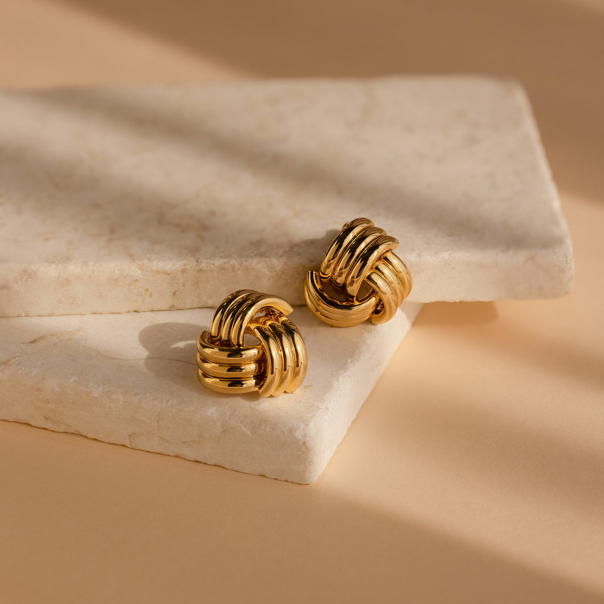 Bold triple knot studs