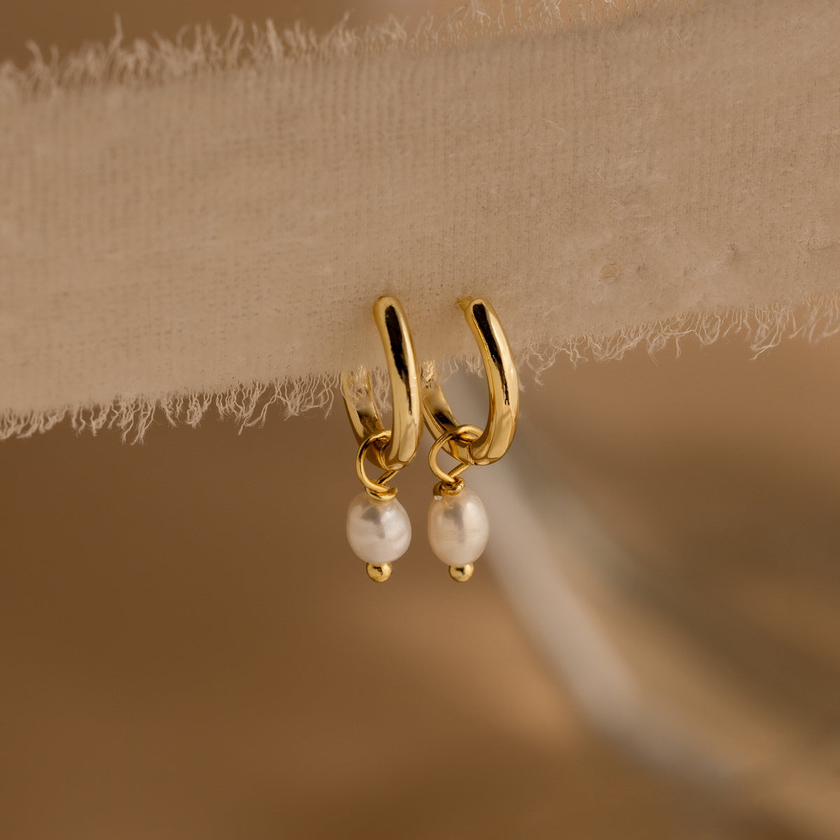 Dainty pearl huggies