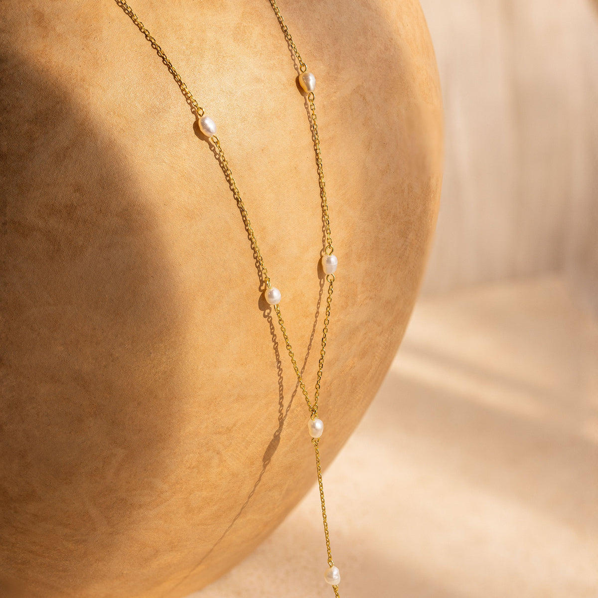 Pearl station lariat necklace