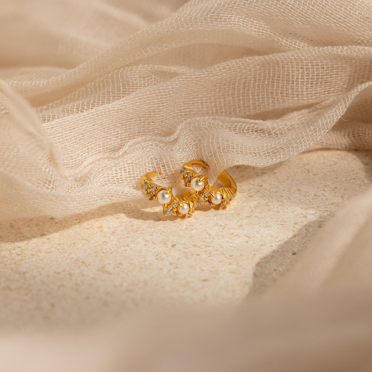 Pearl diamond cluster huggies