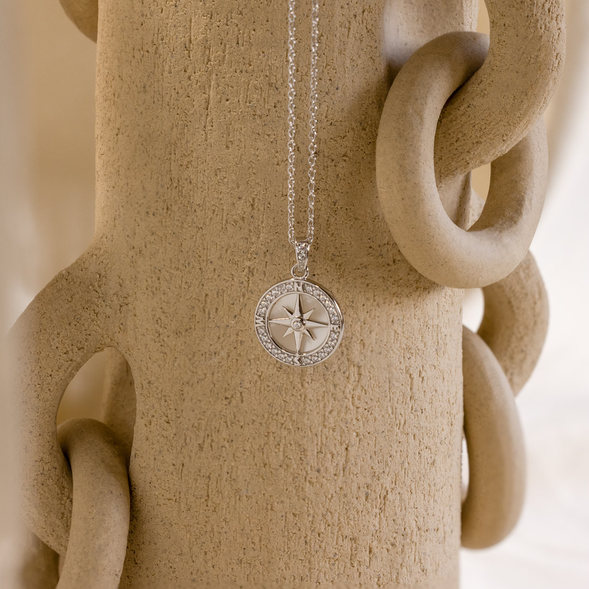 Pave pearl compass necklace