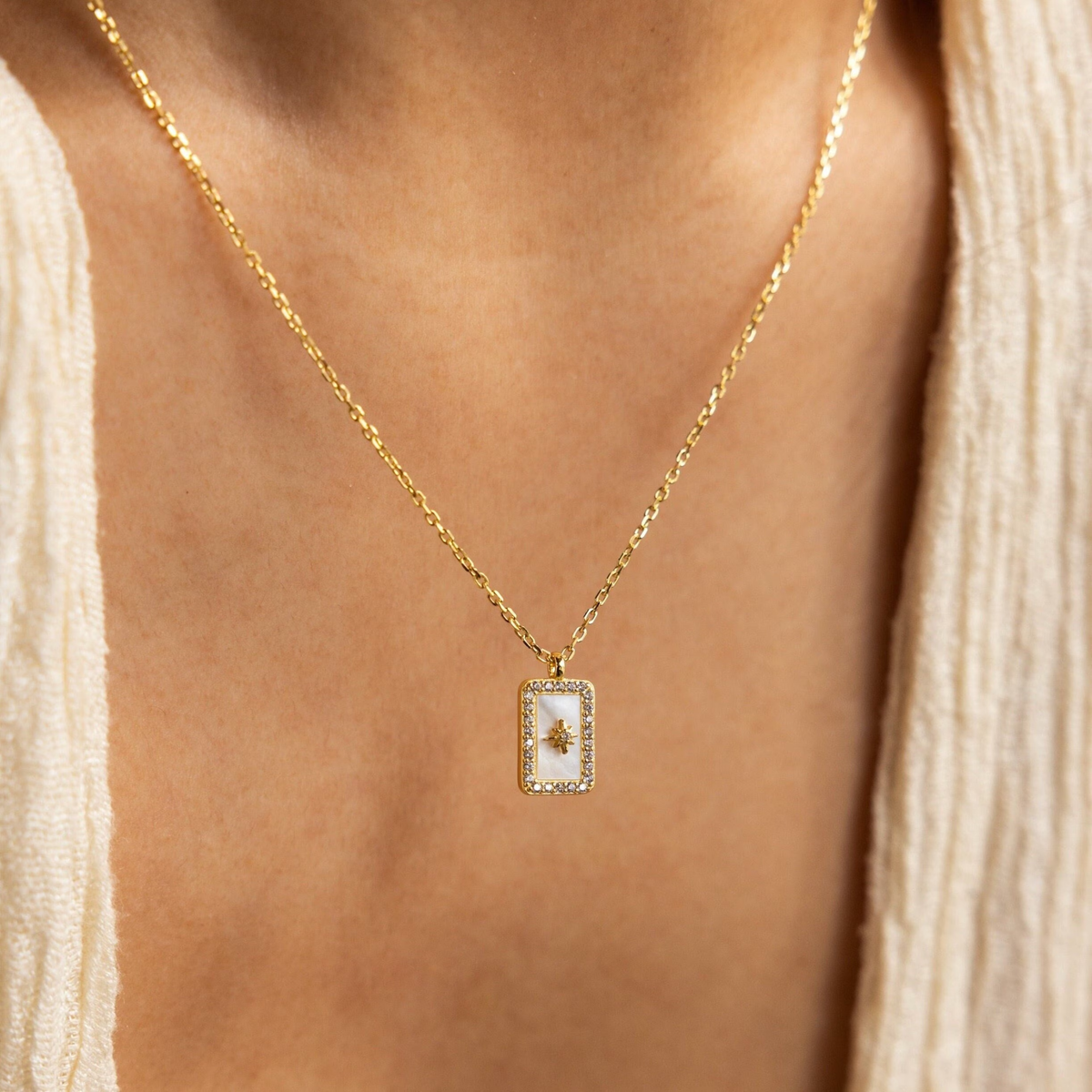 Pave pearl north star necklace