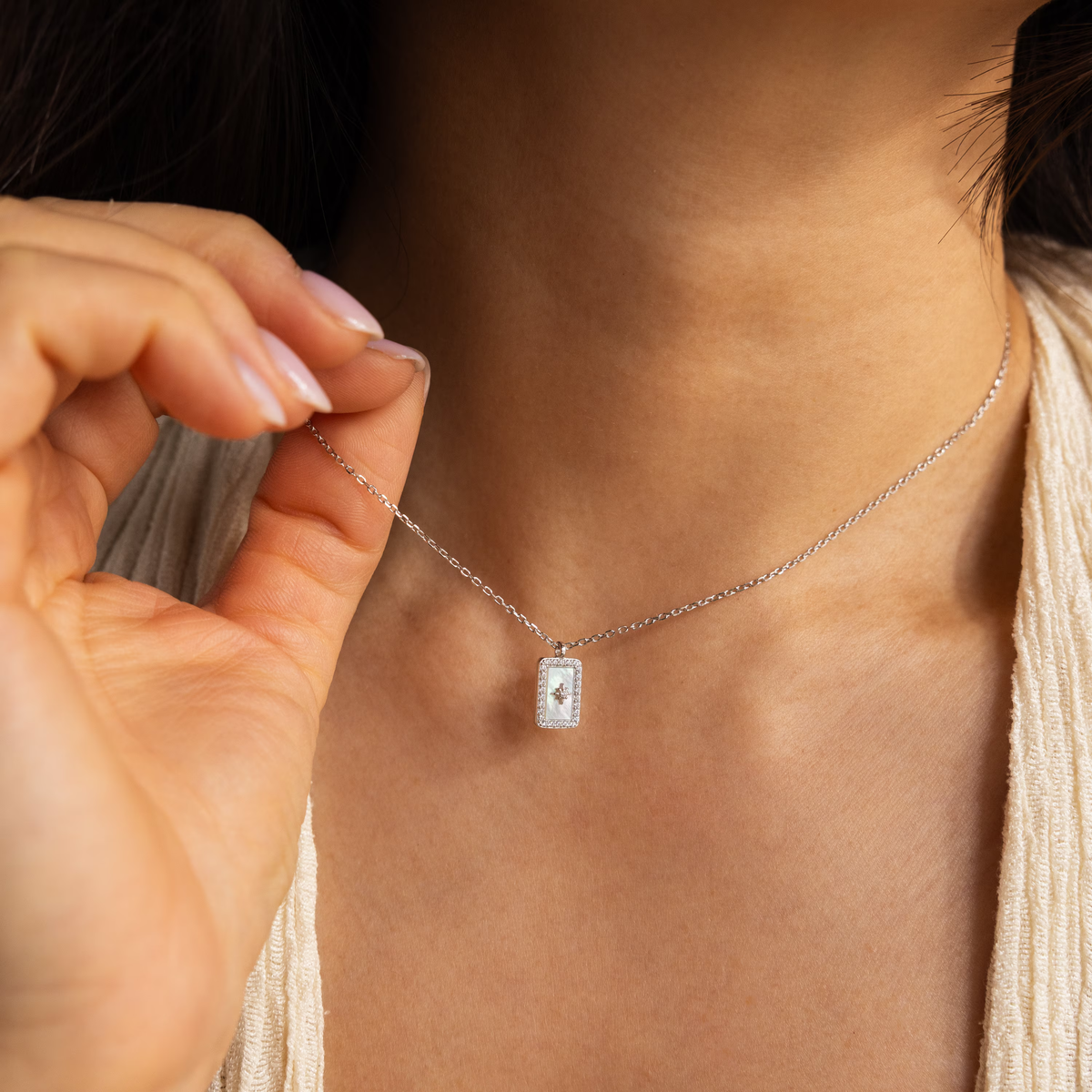 Pave pearl north star necklace