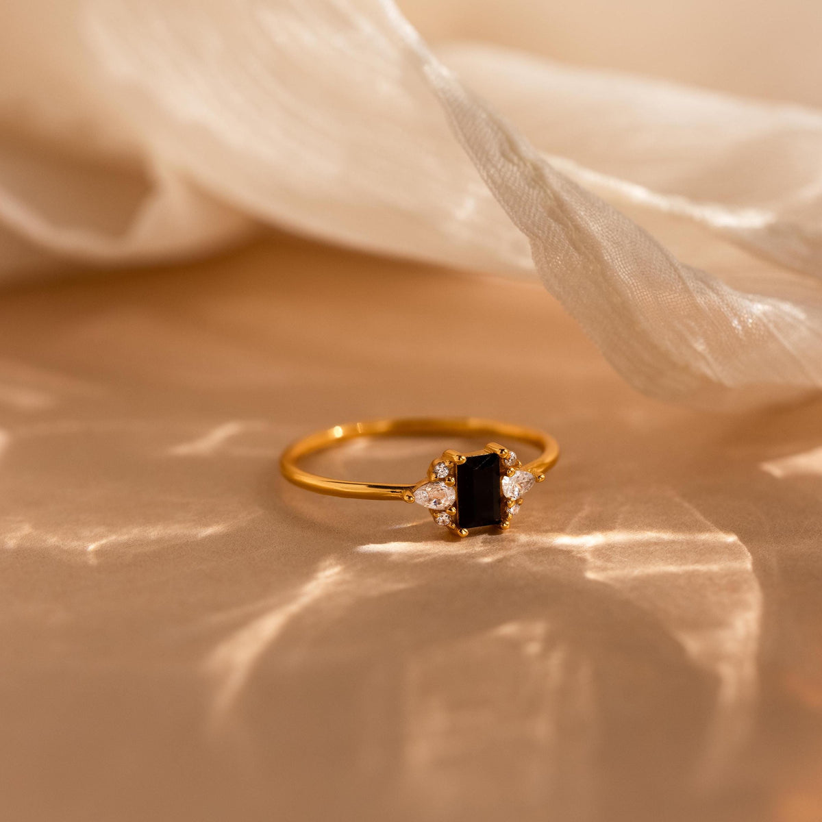 Black baguette diamond ring