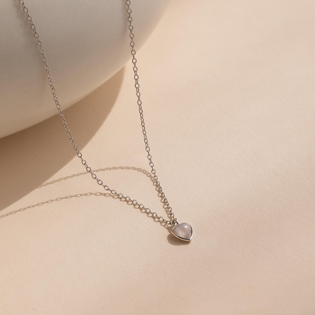 Tiny rose quartz heart necklace