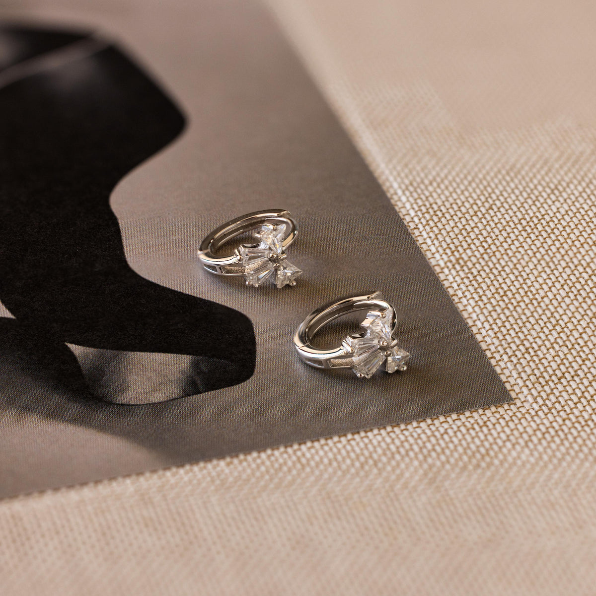 Diamond ribbon bow huggies