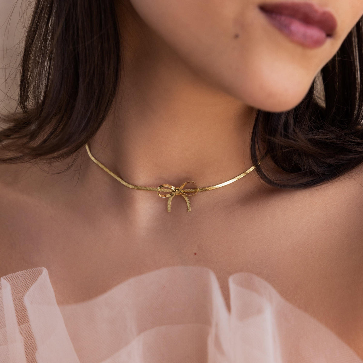 Herringbone bow necklace