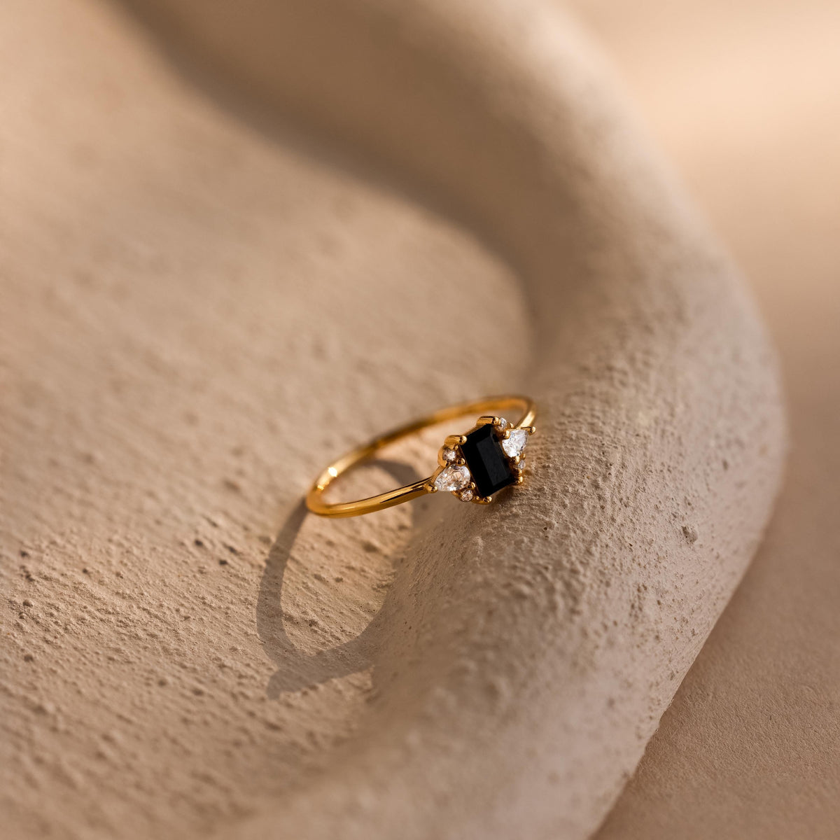 Black baguette diamond ring