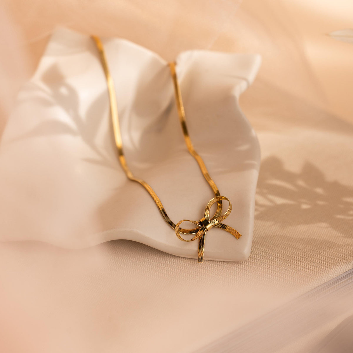 Herringbone bow necklace