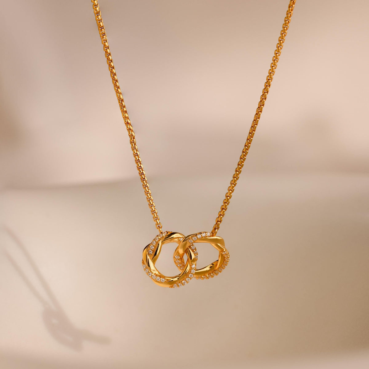 Interlocking pave charm necklace