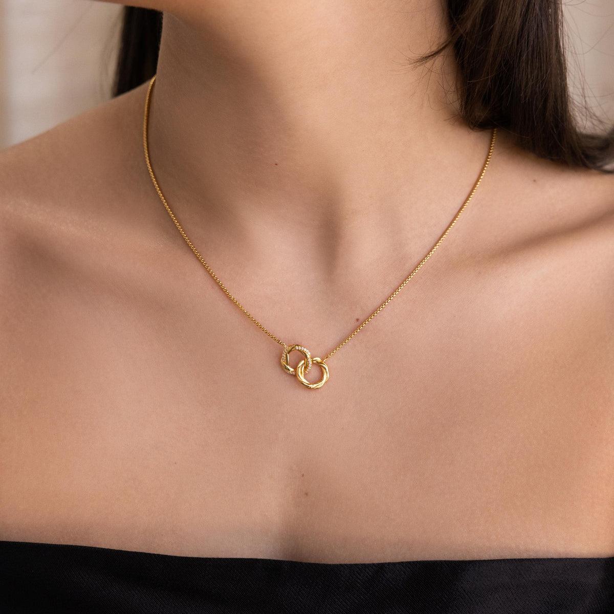 Interlocking pave charm necklace