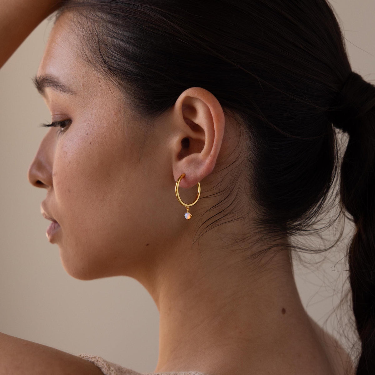 Dainty opal drop huggies