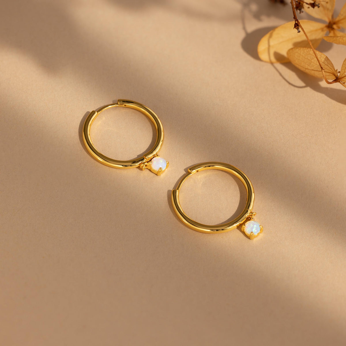 Dainty opal drop huggies