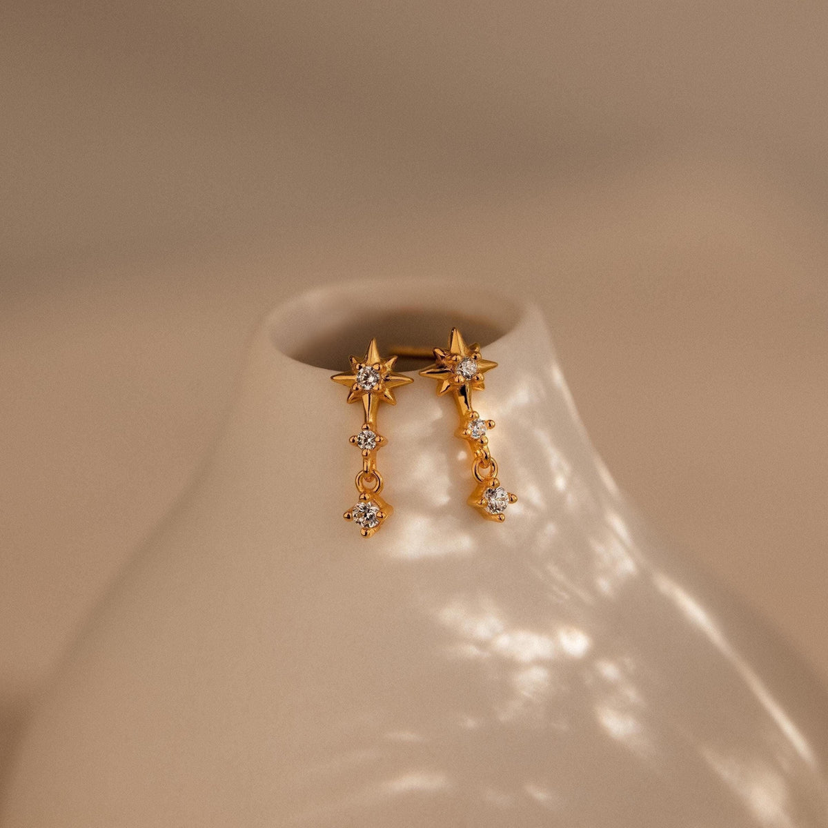 Diamond starburst drop studs 1