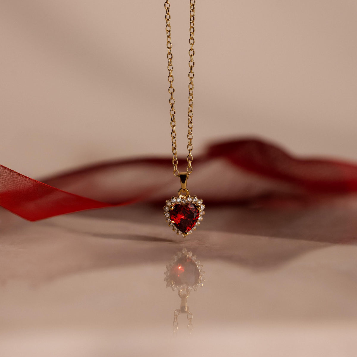 Pave garnet heart necklace