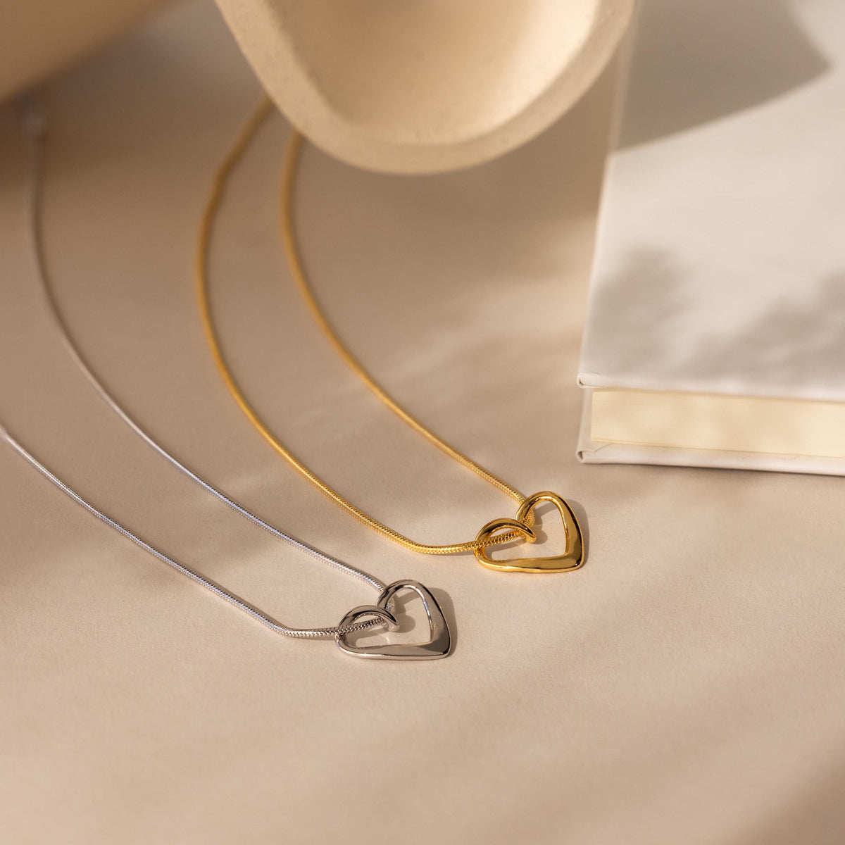 Heart knot necklace