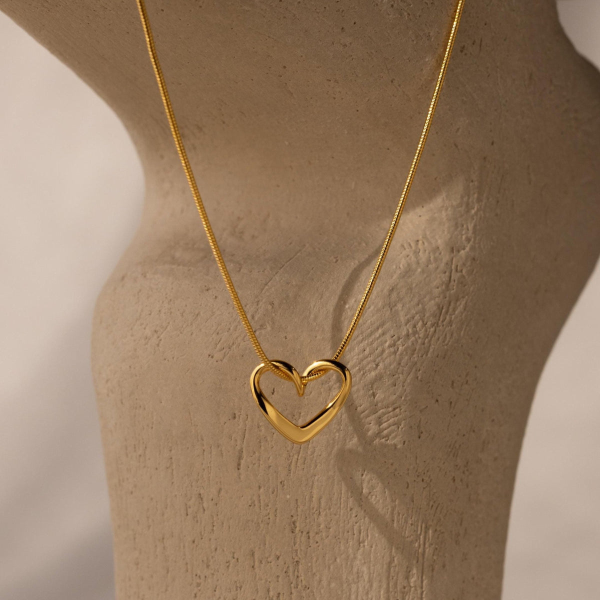 Heart knot necklace