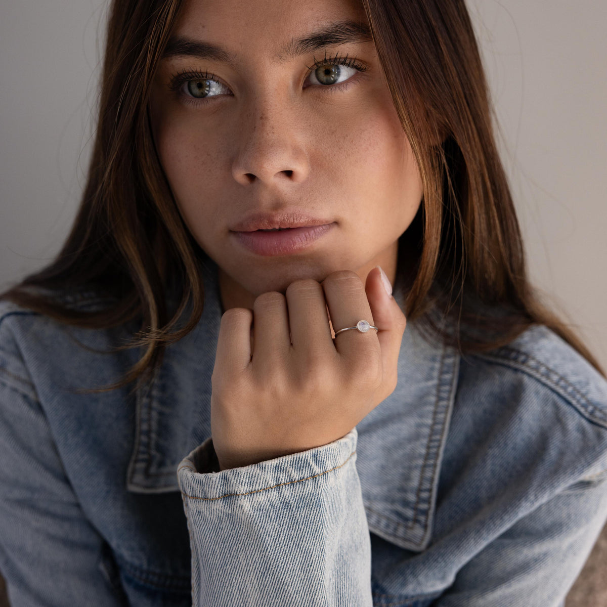 Dainty round moonstone ring