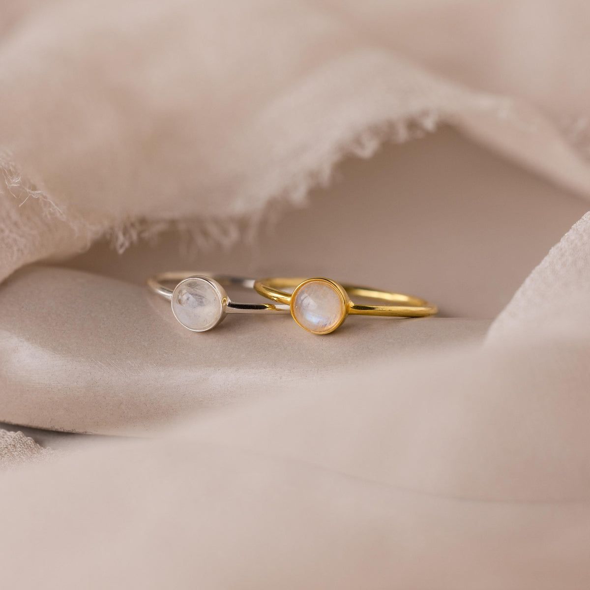 Dainty round moonstone ring