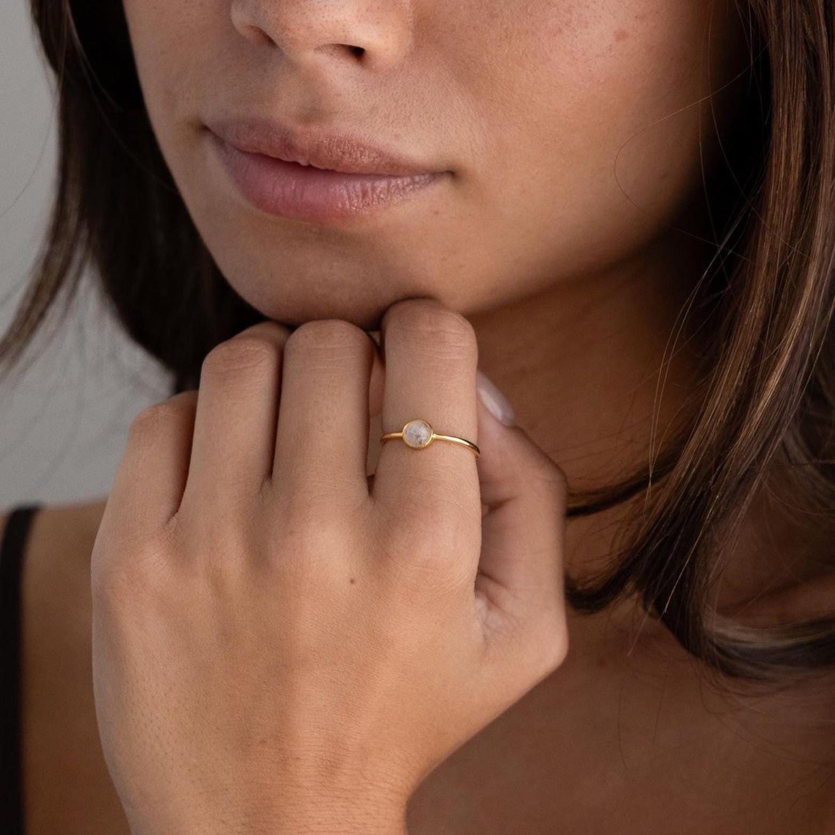 Dainty round moonstone ring