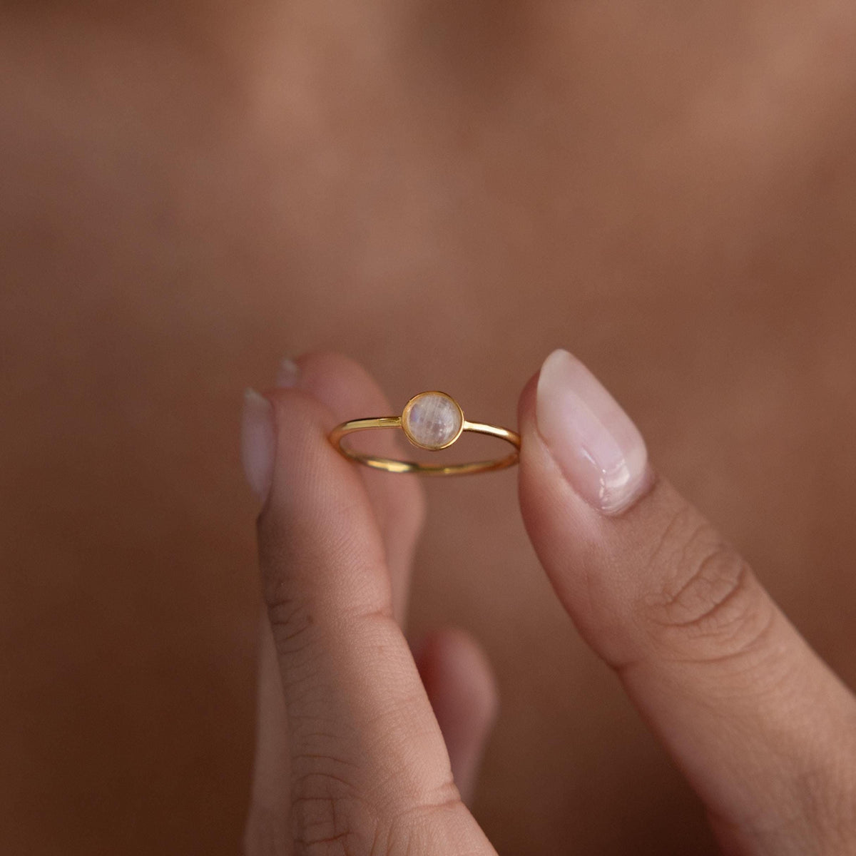 Dainty round moonstone ring