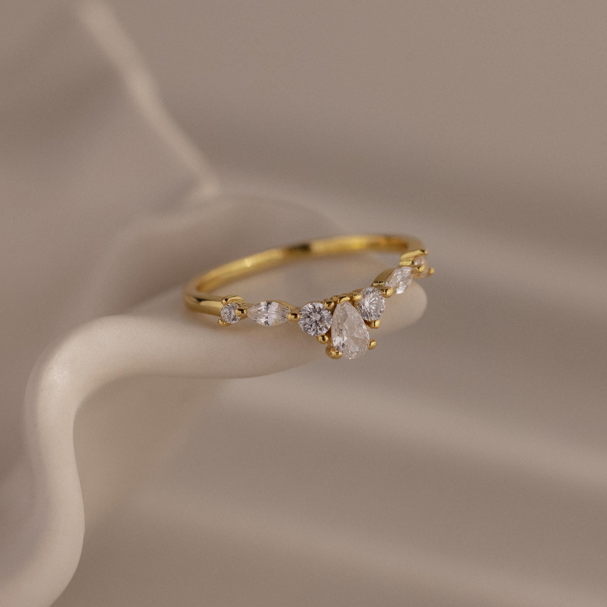 Pear diamond curve ring