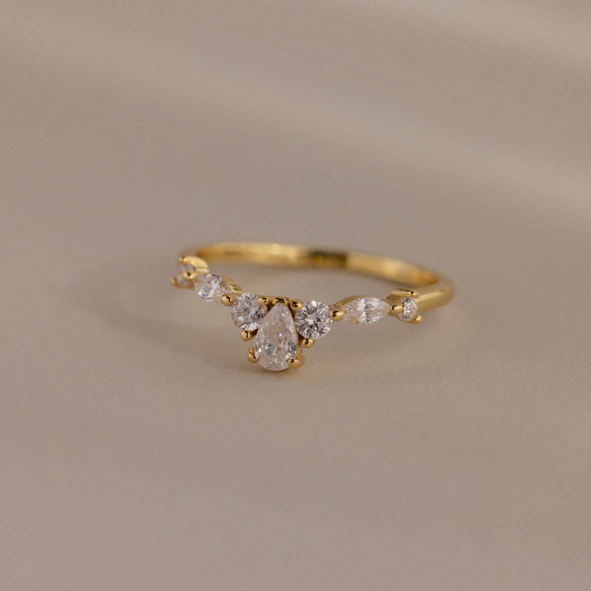 Pear diamond curve ring