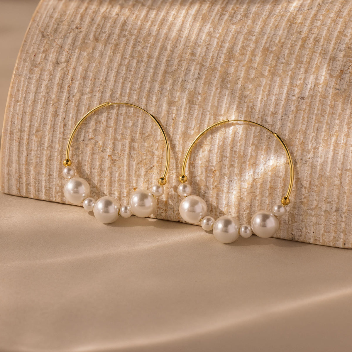 Statement pearl hoops 7