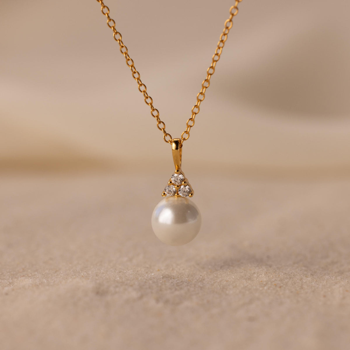 Diamond halo pearl necklace