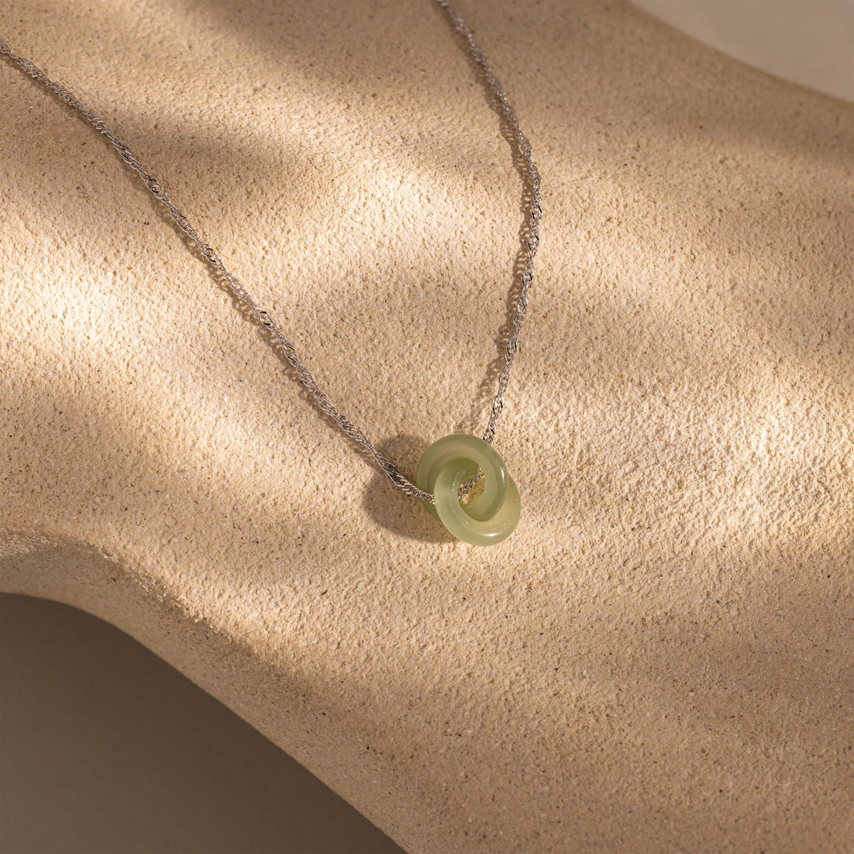Interlocking jade circle necklace