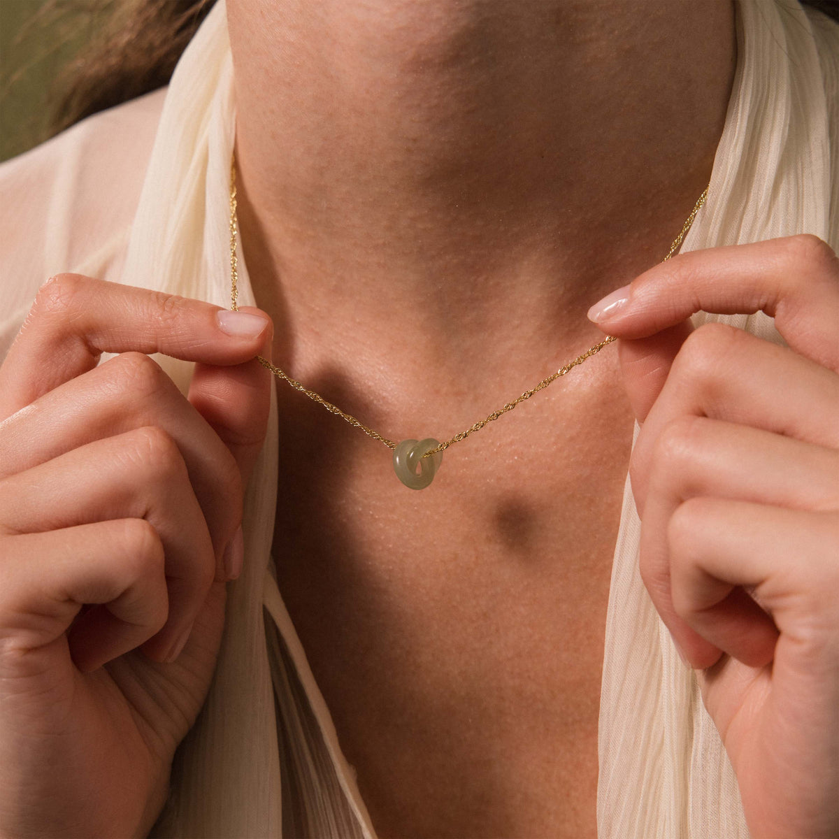 Interlocking jade circle necklace