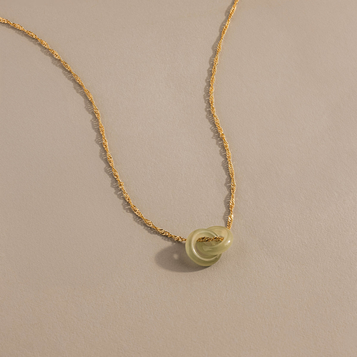 Interlocking jade circle necklace