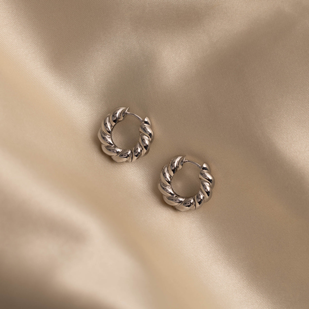 Sculpted twist hoops 3