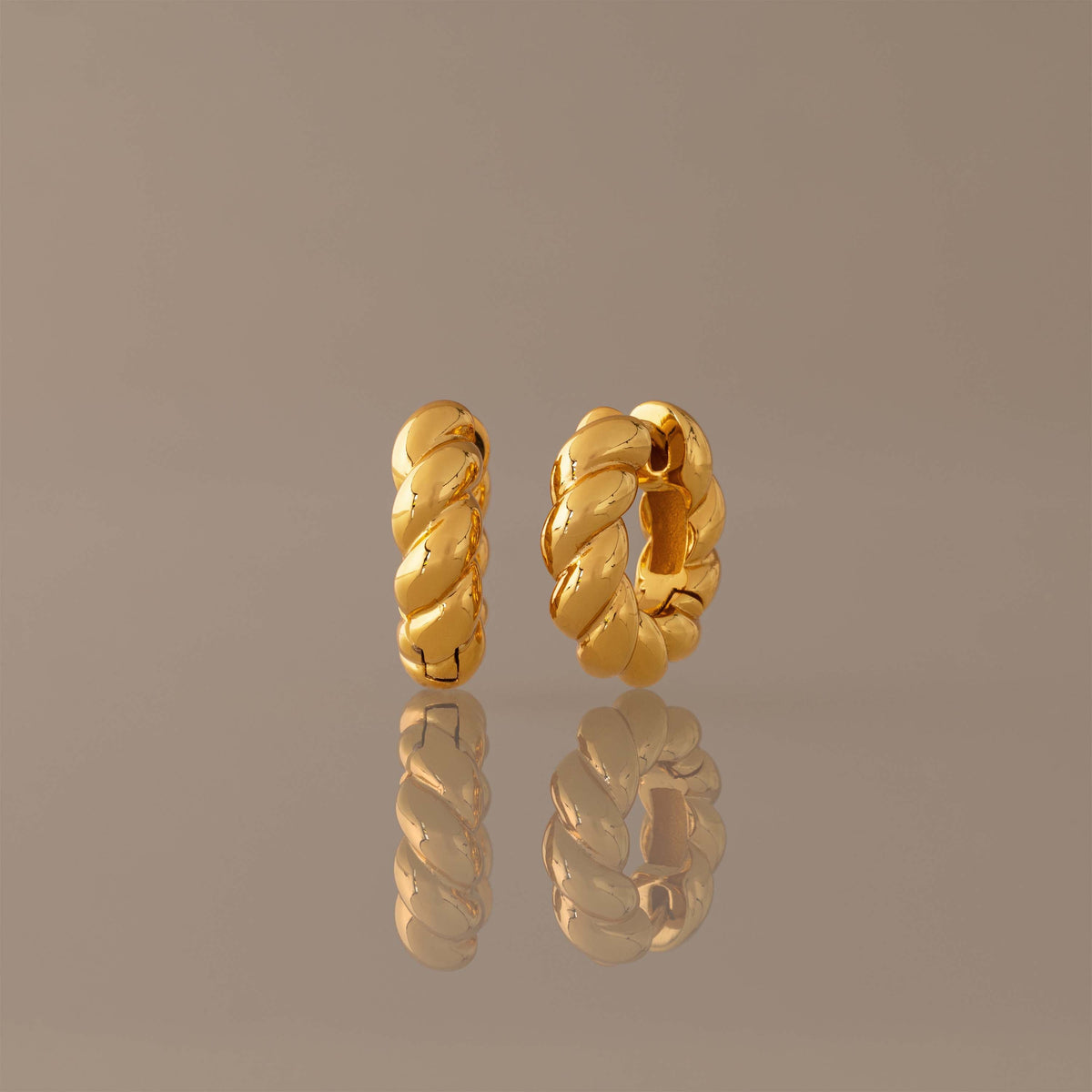 Sculpted twist hoops 1