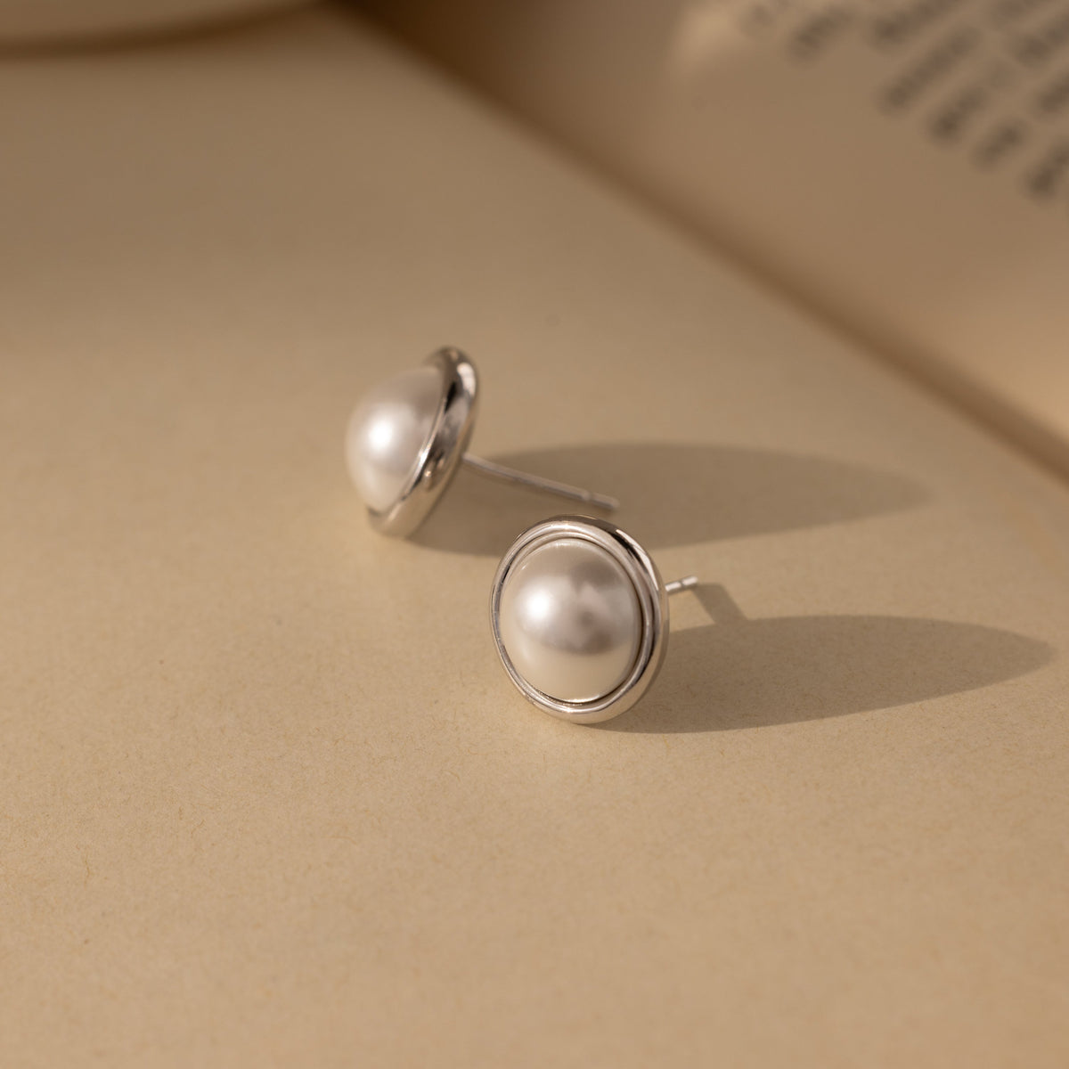 Pearl bezel studs 5