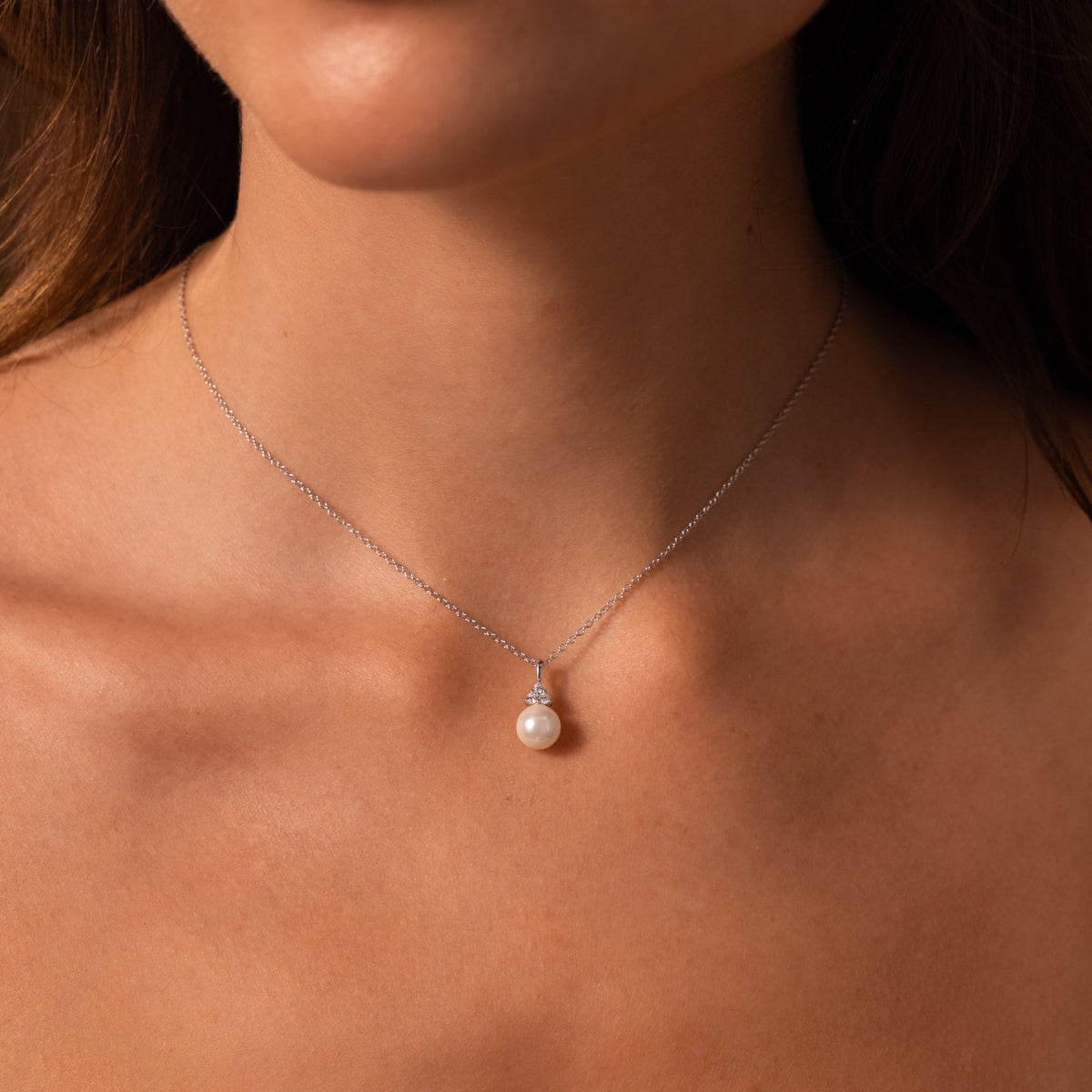 Diamond halo pearl necklace