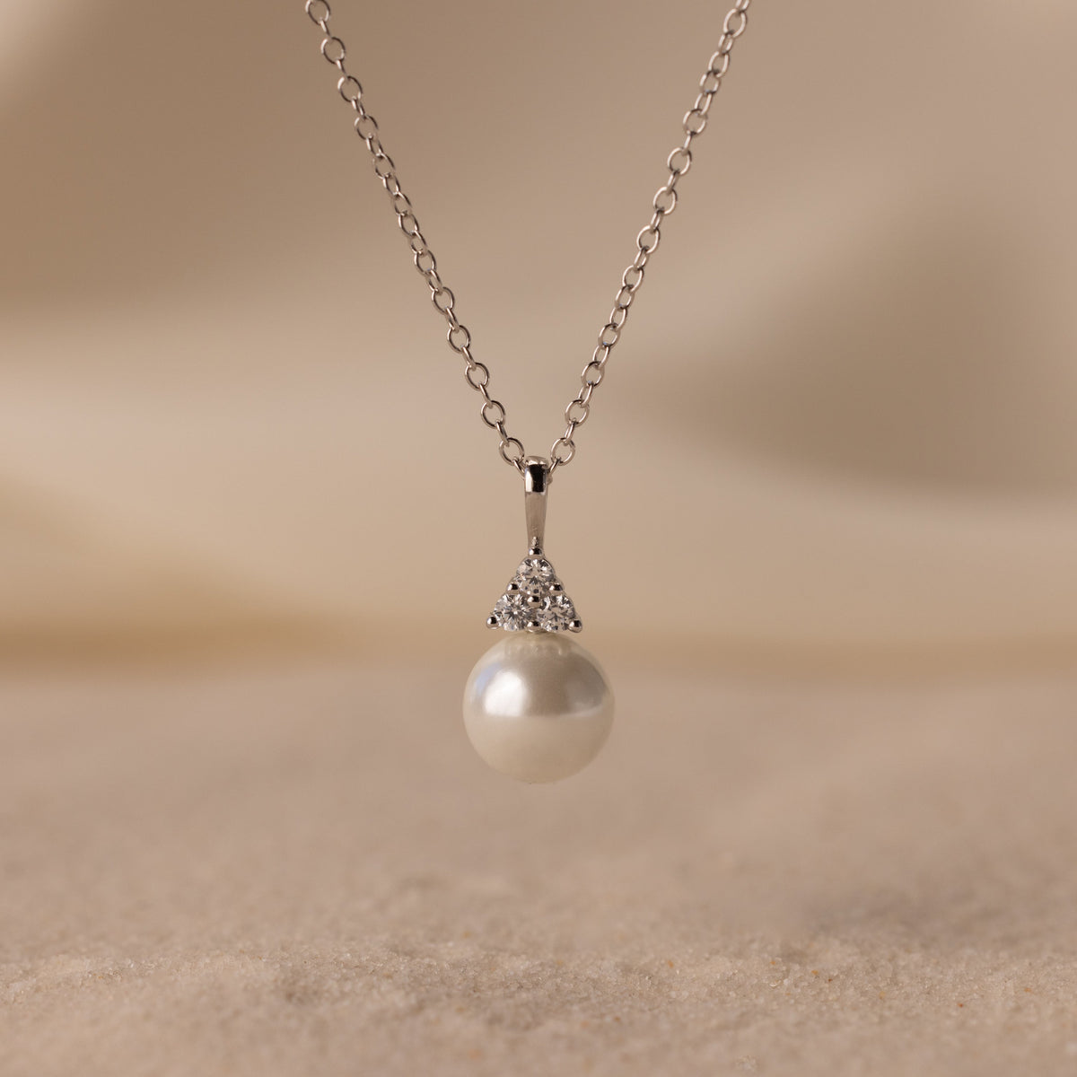 Diamond halo pearl necklace