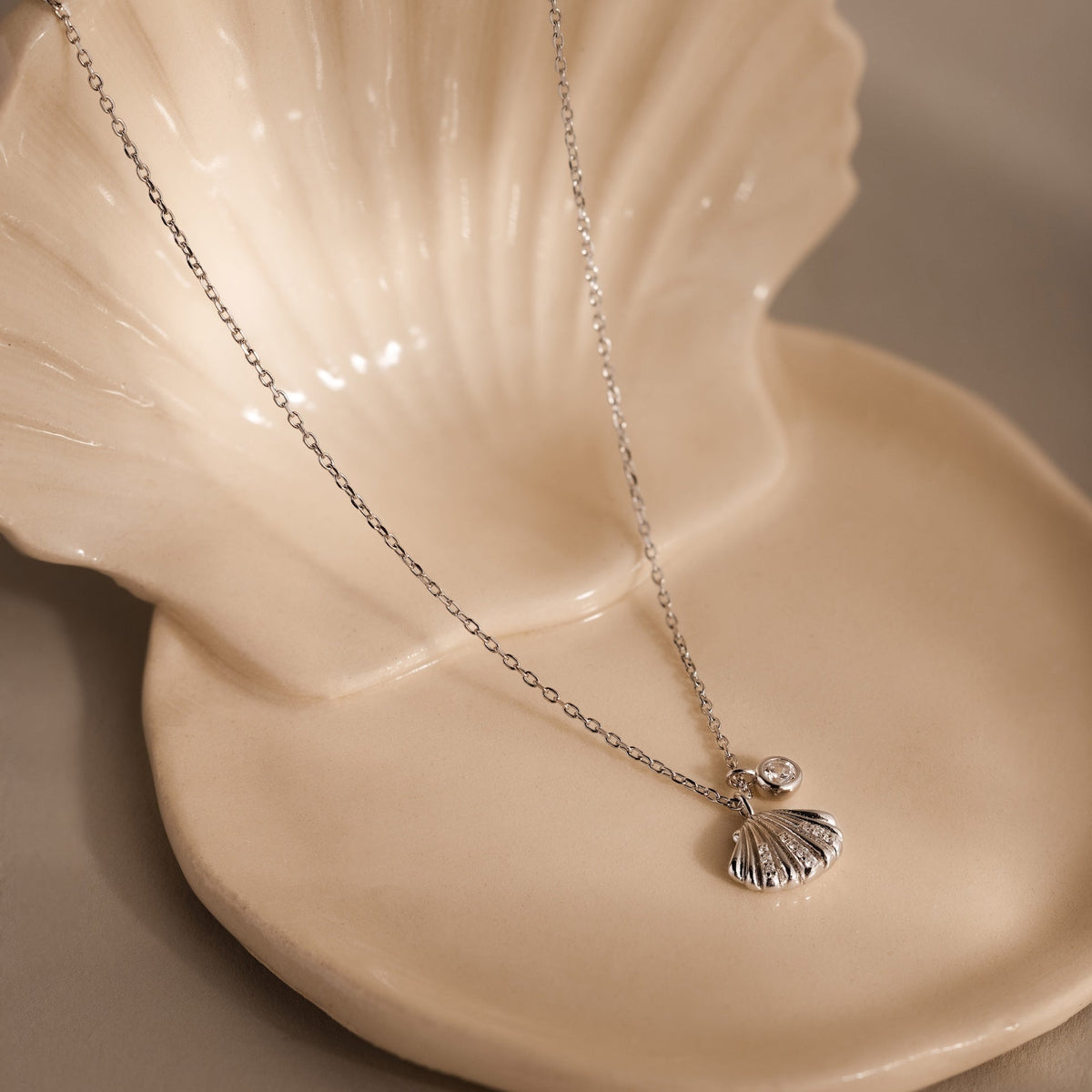 Diamond seashell charm necklace